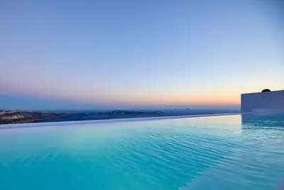 Image de Charming Santorini Apartment | Gaderois Apartment | 2 Bedrooms | Private Furnished Terrace with Outdoor Heated Pool with Spectacular Caldera and Volcano Views | 25is Martiou, Imerovigli