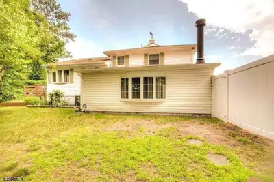 Image de Spacious 4 bedroom house with Ac, WiFi, fitness room in charming Somers Point.