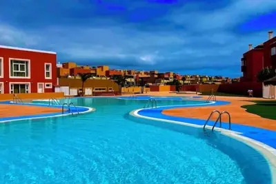 Mirador de Las Dunas garden villa with sea, nature park and island views.