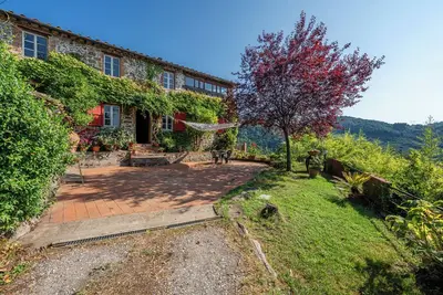 Image de Maison de vacances 'Podere In Cima' avec piscine privée, terrasse privée et Wi-Fi