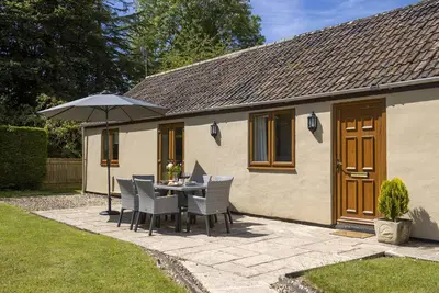 Image de Stable Cottage is a spacious, detached, welcoming property set within tranquil grounds of Hales Farm