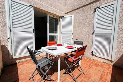 Image de Appartement T2 avec terrasse, parking privé, à 600m de la plage - Idéal famille et animaux admis
