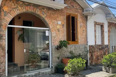Image de Casa de Tijolos com Churrasqueira Vila Fechada