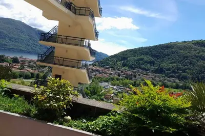 Image de 2-room apartment with parking space, sunny balcony and lake view