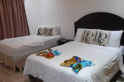 Image de Room for 4 people with access to private beach