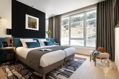 Image de Wifi, pied des pistes de ski, piscine, sauna, hammam, balcon, parking, télévision, 145m², Flaine