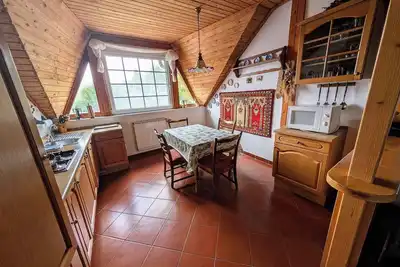 Image de Appartement de vacances avec grand jardin, WiFi et climatisation
