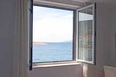 Image de Beachfront Apartments Tamarix - Superior One Bedroom Apartment (Grand) 1