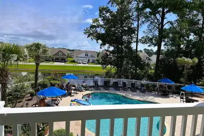 Image de Hibiscus Haven - Little River - Cute 2b/2b Condo w Pool - 90+ Day Midterm Rental