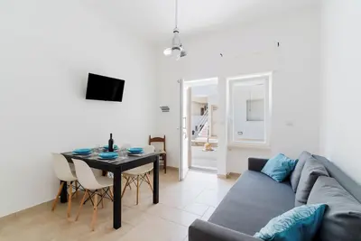 Image de Appartement 'Elegante Appartamento Zona Castello' avec Wi-Fi et climatisation