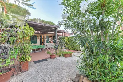 Image de Appartement 'Appartamento Baia Di Mola' avec jardin privé
