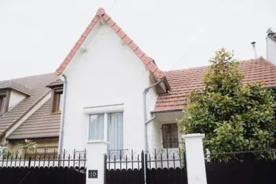 Image de Joli pavillon avec jardin et barbecue
