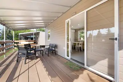 Image de Bungalow \"Casa Mobile 3\" avec terrasse privée, jardin privé et climatisation