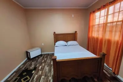 Image de 9 mins from National Stadium, New home with Jacuzzi