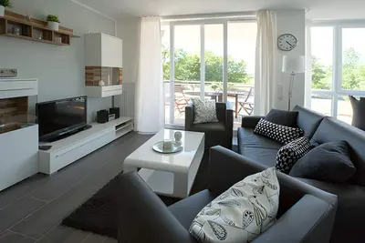 Image de Leuchtturm 7 - Modern apartment with sea view, just a few steps from the beach