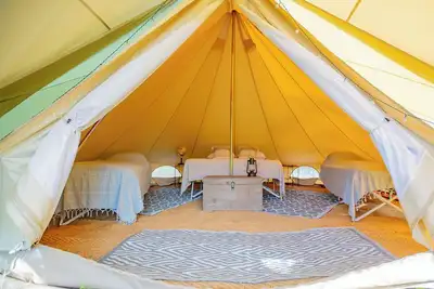 Image de Glamping 'Hébergement Insolite En Tente' avec jardin privé