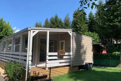 Image de Bungalow \"Casa Mobile 2\" avec terrasse privée, jardin privé et climatisation