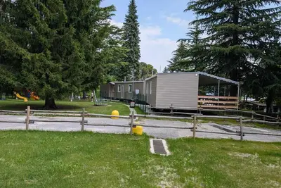 Image de Bungalow 'Casa Mobile 8' avec terrasse privée, jardin partagé et climatisation