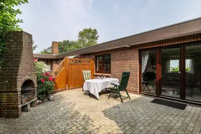 Image de Appartement Alter Deich avec terrasse privée, jardin privatif et Wi-Fi