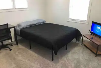 Image de Private 2-bed house with free parking and 15-min walk to direct Nyc Manhattan train