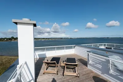 Image de Hamptons Beach House - Panorama-dachterrasse, Sauna, Kamin, 2 Stellplätze