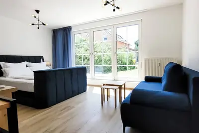 Image de Terrasse - Parkplatz - Tv im Boxspringbett - KĂĽche