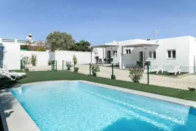 Image de Maison de vacances 'Apartamentos La Esencia Del Sur B' avec piscine partagée, Wi-Fi et climatisation