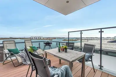 Image de Dock 76 Bridge - am Strand, Meerblick, Sauna, Überdachter Balkon