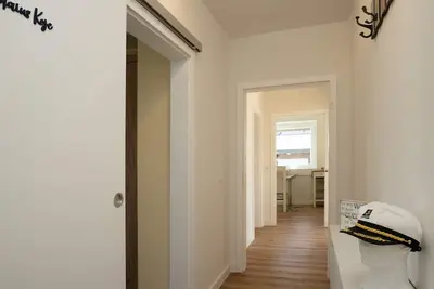 Image de Captains Quarters 2 - Strandnahe Traumhafte Ferienwohnung im Maritimen Flair