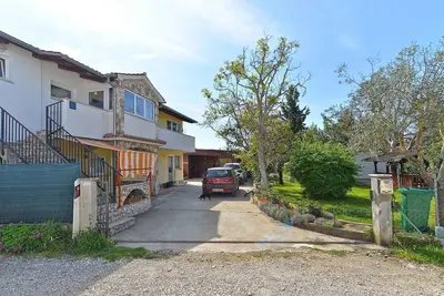 Image de Appartement de vacances avec jardin et barbecue