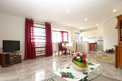 Image de Appartement de vacances avec jardin et barbecue