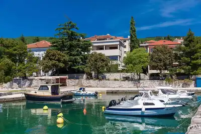 Image de Appartement de vacances avec climatisation et vue sur la mer