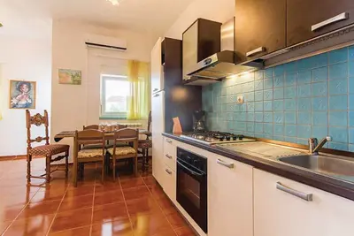 Image de Appartement de vacances avec jardin et barbecue