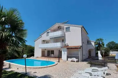 Image de Appartement de vacances avec climatisation et piscine extérieure