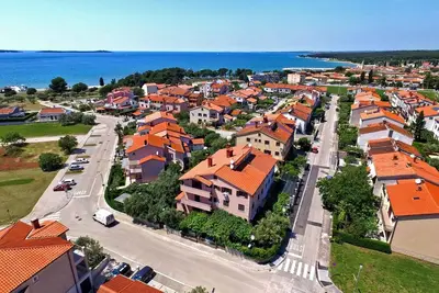 Image de Appartement de vacances avec jardin et barbecue
