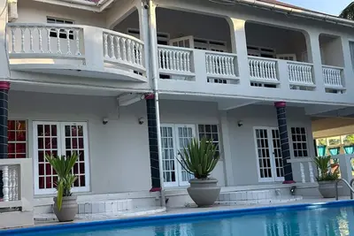 Aparthotel 5-minutes away from beach w/ Ac, Wi-Fi, & pool view in RodneyBay