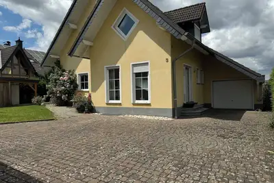 Image de Ferienwohnung Sonnenkastell 2 in der Burgstadt Kastellaun mit Direktem Garten
