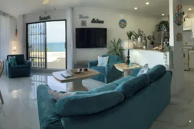 Luxurious Beachfront Condo with Breath Taking Ocean, Beach and Garden Views.