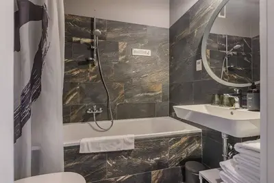 Image de Triple room with bath, Wc 1n - B&B Berglift