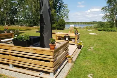 Image de Waterfront cottage by the lake Åsnen (Please note: no electricity or running water)