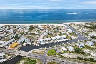 Image de Canal Front \"Paradise Palms 1\" is a luxury townhome with gulf views, sleeps 10, short walk to beach!