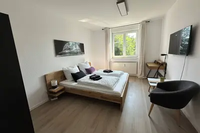 Image de Kirschbaum Apartment - Schnell im Zentrum und Schnell im Grünen und am Wasser
