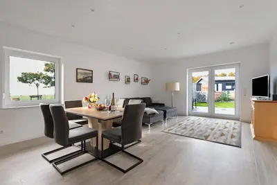 Image de Appartement 'Seelenwärmerstuuv' avec terrasse privée, jardin privé et Wi-Fi
