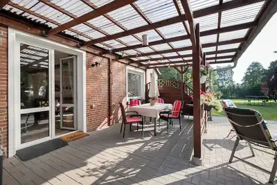 Image de Appartement 'Bi Tiessens To Hus' avec terrasse privée, jardin partagé et Wi-Fi