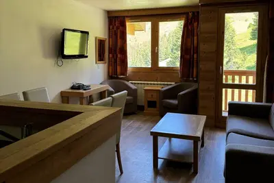 Image de Appartement cosy avec accès direct aux pistes, espace bien-être et piscine chauffée
