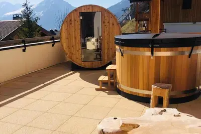 Image de Appartement \"Cocooning-sauna-jacuzzi\" avec vue montagne, terrasse privée et Wi-Fi