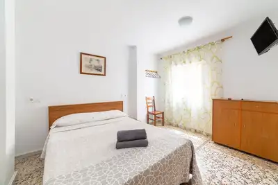 Image de Chambre 'Doble 14' avec Wi-Fi et climatisation