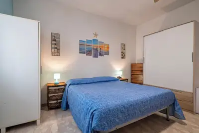 Image de Appartement 'Alghero Lido A 100mt Dalla Spiaggia' avec vue sur la mer, balcon et Wi-Fi