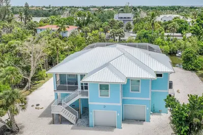 Image de Deja Blue | Lux Canal-Front Sanibel Home with Saltwater Pool and View