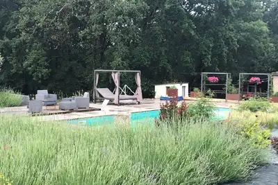 Image de Grange en pierre  avec grande piscine animaux acceptés